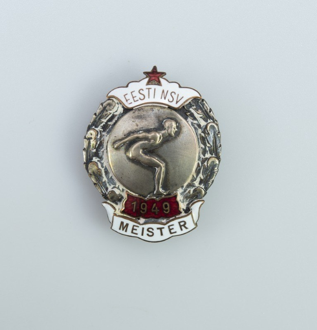 Silberner Button mit rotem Stern und Text, Emblem der deutschen Olympischen Spiele 1949.