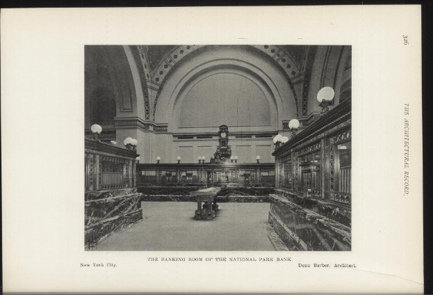 Ein Schwarz-Weiß-Foto der Geschäftsstelle der National Park Bank in New York City, das Tische, Lampen, eine Wanduhr und Text am unteren Rand zeigt.