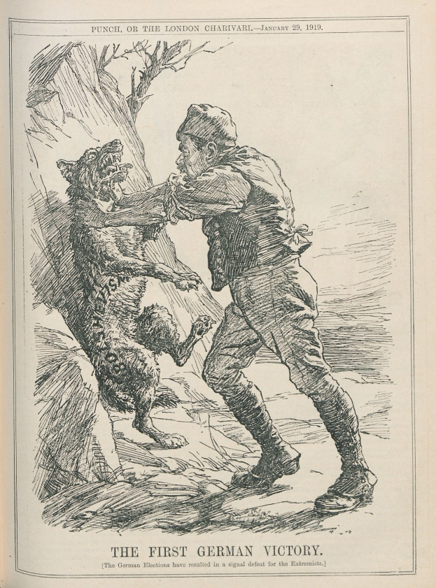 Ein aufgeschlagenes Buch mit einer Zeichnung eines Mannes mit Hut und einem Hund daneben, mit der Aufschrift 'Die erste deutsche Niederlage' auf dem Cover.